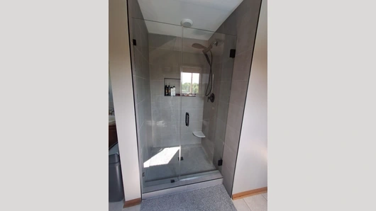Bathroom remodel plumbing with glass shower and shower fixture installation in Slinger, Wisconsin